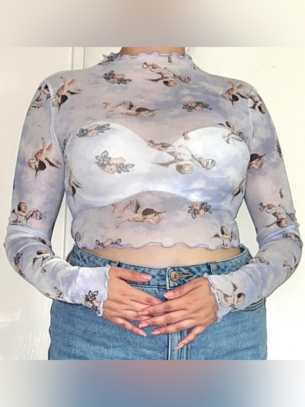 Blue mesh angel crop top.